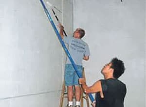 Volunteers painting the new Winona Volunteer Services building